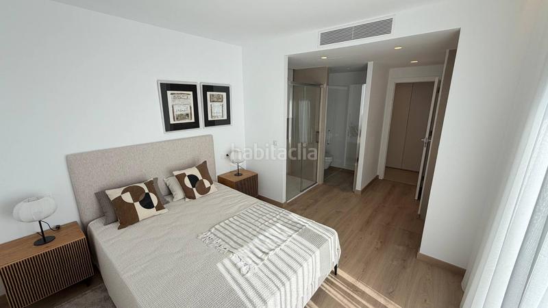 Foto 71a88e47-adec-4290-9652-fbb64bb62d10. Casa aparellada amb piscina a Golf Bahía Finestrat