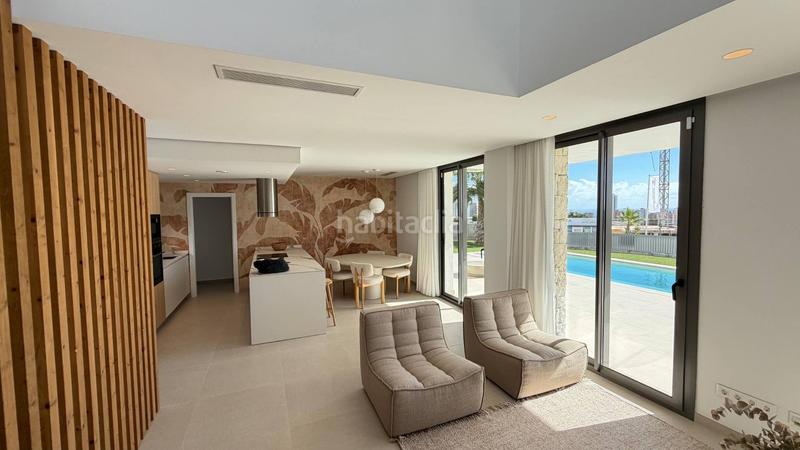 Foto 0986dd7f-a4ad-4902-b36a-ce9e748dd962. Casa bifamiliare con piscina in Golf Bahía Finestrat