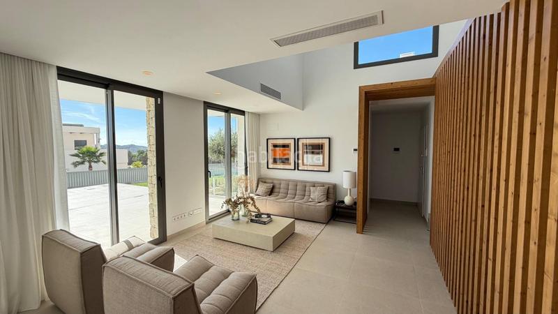 Foto 48aa05d1-d9a5-4b81-aec3-ebc5734d623a. Casa bifamiliare con piscina in Golf Bahía Finestrat