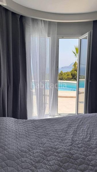 Foto 252289b6-1b64-4f73-977b-aef1d627c294. Casa amb aparcament piscina a Mascarat Altea