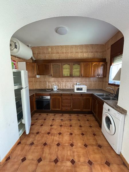 Foto 0ce6a9b5-a96b-4bff-ad01-d21a277eaa34. Casa adossada amb xemeneia aparcament a Pino Alto Miami Platja