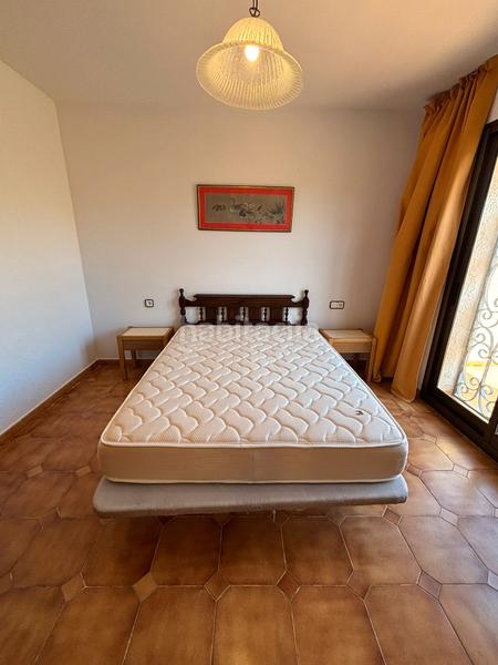 Foto d12ac28b-d0fb-4bc9-8c8a-0b62f7e191fb. Casa adossada amb xemeneia aparcament a Pino Alto Miami Platja