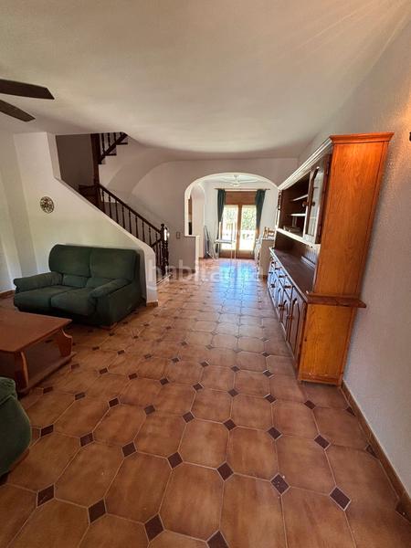 Foto e18a3c1d-2e53-4126-96df-77b79d2f4601. Casa adossada amb xemeneia aparcament a Pino Alto Miami Platja