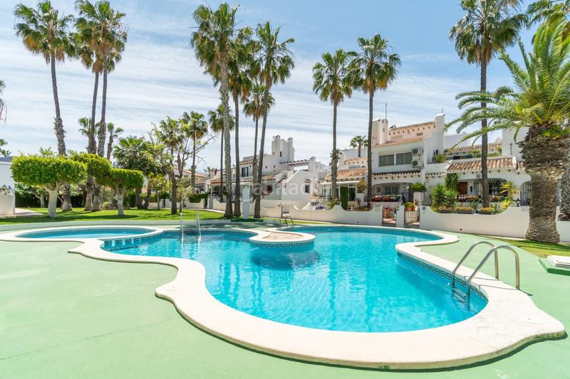 Foto 0449fcc1-e8fe-4e7c-bfe8-f3d5adb6dd63. Affitto casa a schiera con piscina in Villamartín-Las Filipinas Orihuela