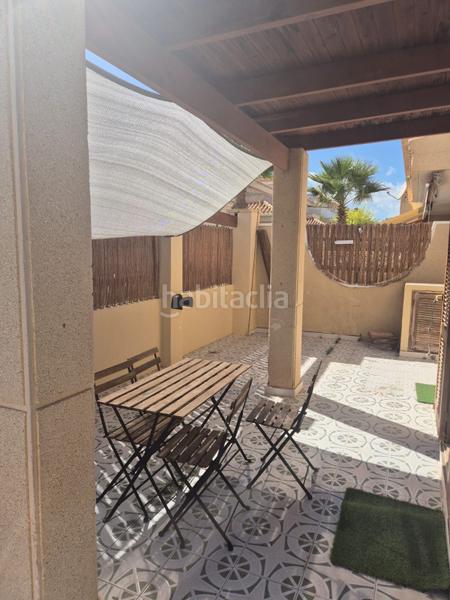 Foto a55af8f9-fc47-4ab0-bfa6-ff56fa20a3ff. Casa adossada amb calefacció piscina a Playa Flamenca Orihuela