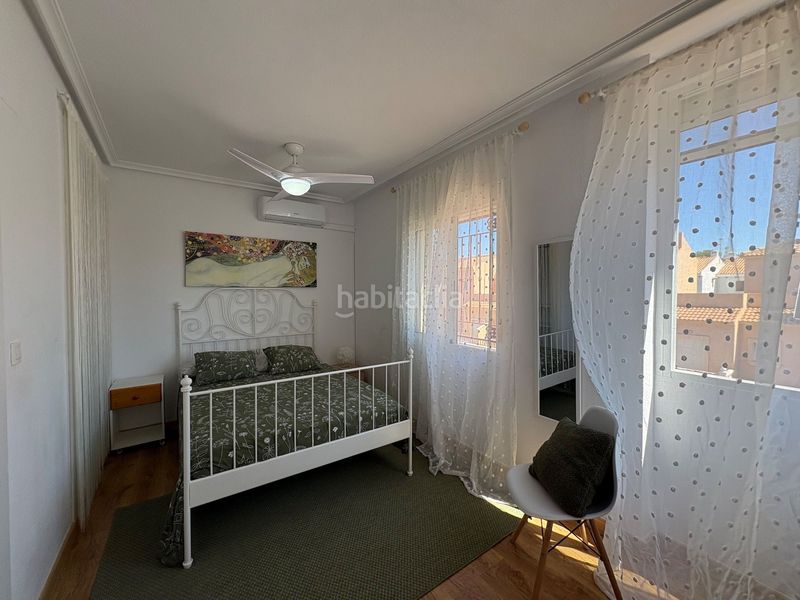 Foto ff698f57-aabc-4395-8bab-7b1fb57c066a. Casa adossada amb calefacció piscina a Playa Flamenca Orihuela