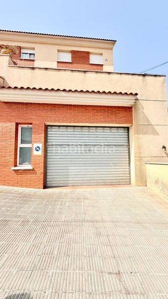 Foto e1f2d2b3-ab96-4903-a816-e31127d2b164. Casa aparellada amb calefacció aparcament a Mas romeu Calafell
