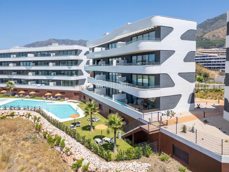 Foto f8c1990a-a4ea-4b4f-9542-fbf70ef9d564. Planta baja en ur-6 el higueron 15 apartamento moderno en planta baja con vistas parciales al mar en venta El Higuerón west, en Fuengirola