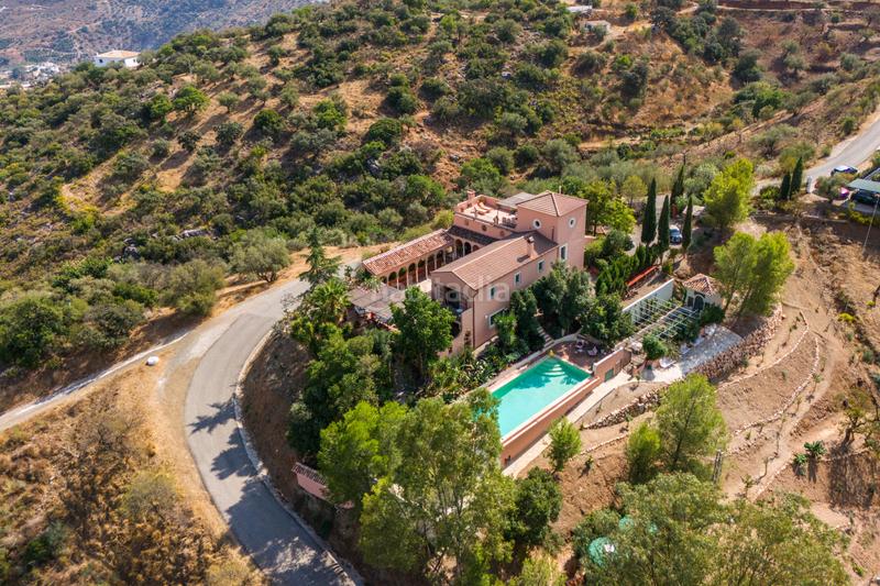 Foto 3b36cbd7-f446-4d09-8463-2108c8a2c940. Haus mit parking pool in Comares