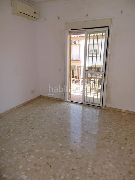 Foto 00086708-ee2b-45ae-9539-e6f057ab4a07. Casa amb calefacció aparcament a Las Torres - Constelaciones Utrera