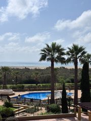 Appartement in Punta del Moral. Apartamento de 2 dormitorios en primera línea de playa de punta
