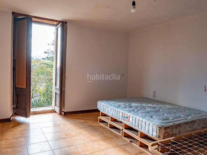 Foto ea755bd0-0731-4699-ad9f-6bd120a68c00. Masia a Sant Feliu de Pallerols