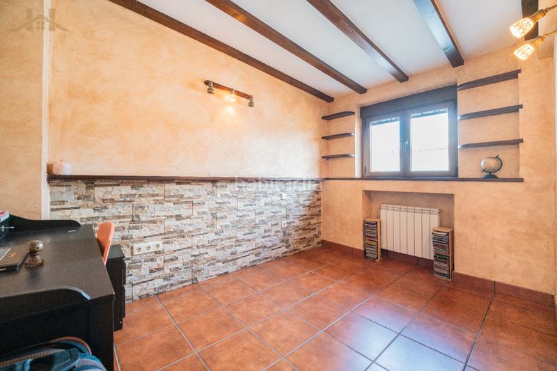 Foto 3a340704-1a5e-4c31-89c3-fa23c575cfe7. Maison jumelée avec cheminée chauffage parking dans Alcobendas