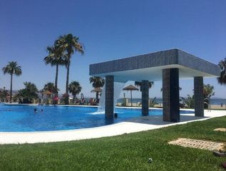 Location Appartement à Olimpiadas 12. En alquiler exclusivo bajo en primera línea de playa con especta