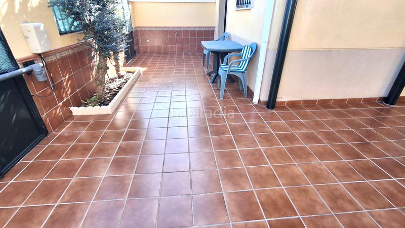 Foto 6f5d7784-be38-42df-9bf0-ca1e52850745. Casa aparellada amb xemeneia aparcament a Almensilla
