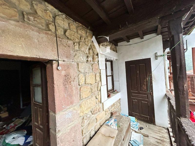 Foto 0c104d4c-7d64-4e06-ad3f-503a9e4db2aa. Casa adosada casona para reformar en cosío en Rionansa