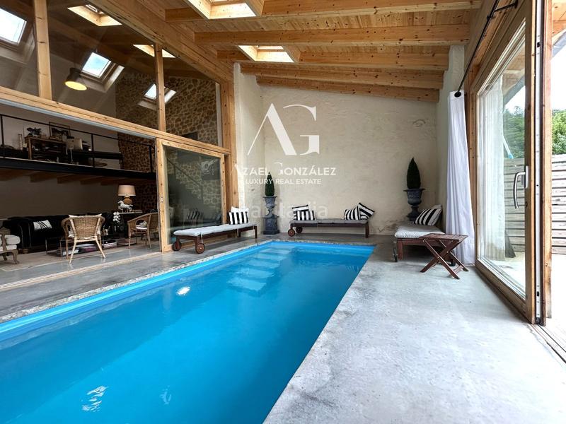 Foto e306f6cc-c15c-468a-9de6-c1ee4a0c4ef4. Casa adossada amb calefacció piscina a Molledo