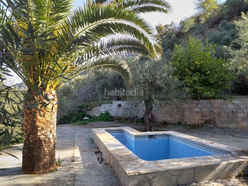 Foto 05573904-9171-4a32-8f9c-67f35b0bcfd3. House with parking pool in Yunquera