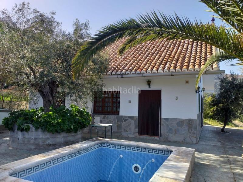 Foto a748aab9-85b4-49a8-8a2c-1343c9086b15. House with parking pool in Yunquera
