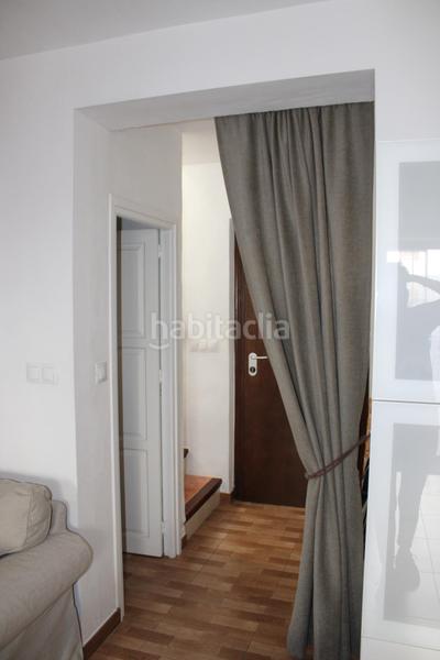 Foto f60ac5ba-d870-41f1-b87c-13d2e3b1e8b7. Casa adossada amb aparcament a Centro ciudad Fuengirola