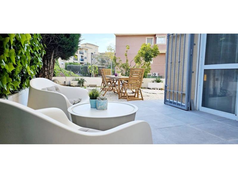 Foto 4cf5696d-6644-4317-813e-1e25be6b4408. Piso exclusiva planta baja de diseño en urbanización altorreal con jardín privado. en Molina de Segura