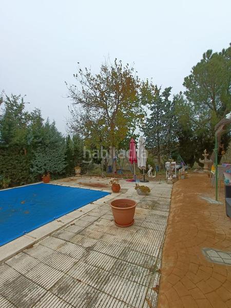 Foto 3179aa77-270f-4591-86b7-4cac90dc6c04. Casa  con parcela, piscina y negocio funcionando en Estremera