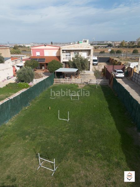 Foto 3a02dc12-e61f-477c-a9b6-ade1fd87bbdc. Casa adossada amb aparcament a Casetas-Villarrapa Zaragoza
