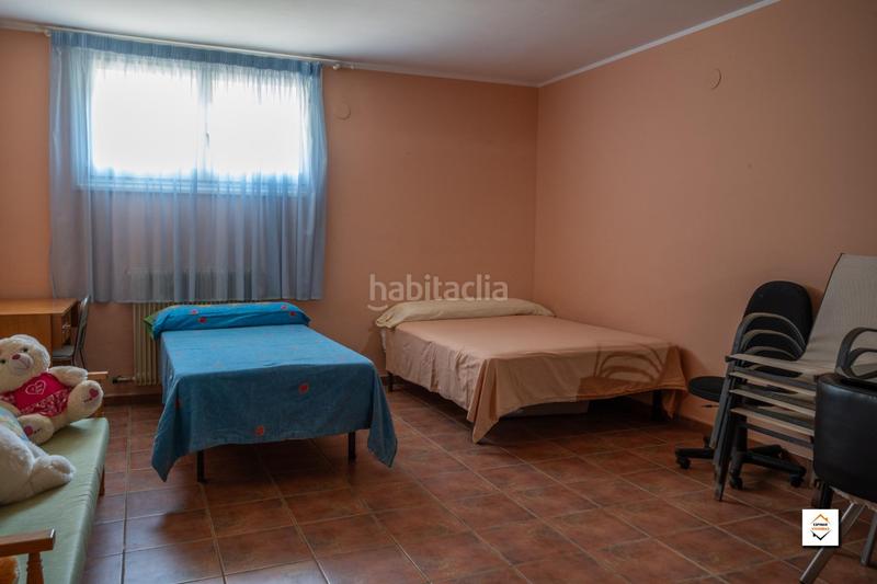 Foto f6bdb121-b71f-4b84-bda1-d53d500cf377. Casa amb calefacció aparcament piscina a Peña el Zorongo Zaragoza