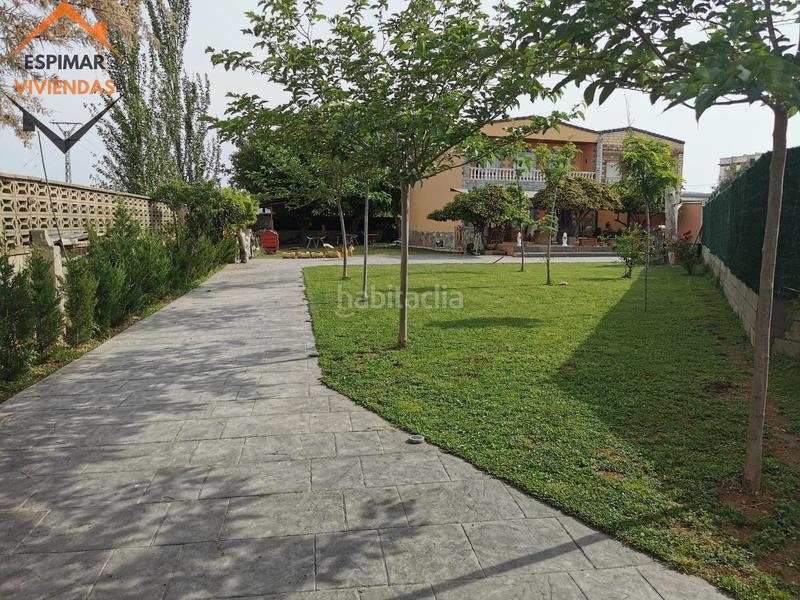 Foto db72a7ad-68bc-4538-8f37-c7264abff554. Casa bifamiliare con riscaldamento parcheggio piscina in Zaragoza