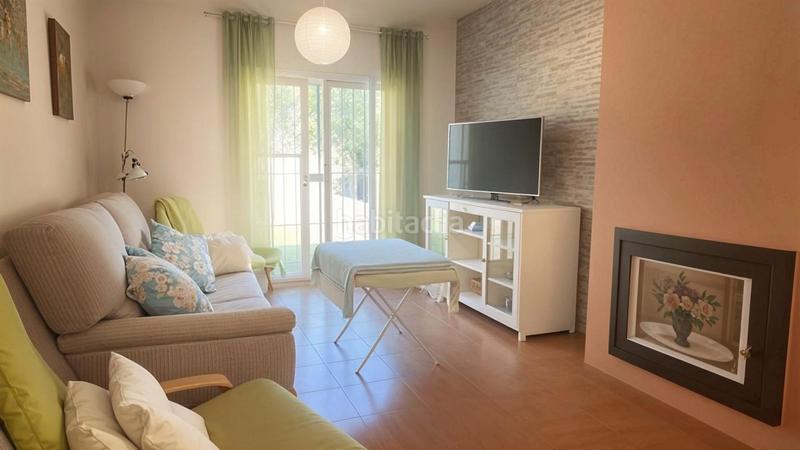Foto 1c689bee-a672-45a5-897f-7b12d3bfdb01. Casa adosada tu hogar familiar adosado con jardín y parque infantil en Ayamonte