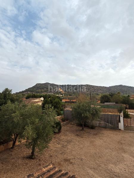 Foto a290c235-38d6-43a3-9e6e-d854db84f15f. Masia amb xemeneia aparcament a Llucmajor interior Llucmajor