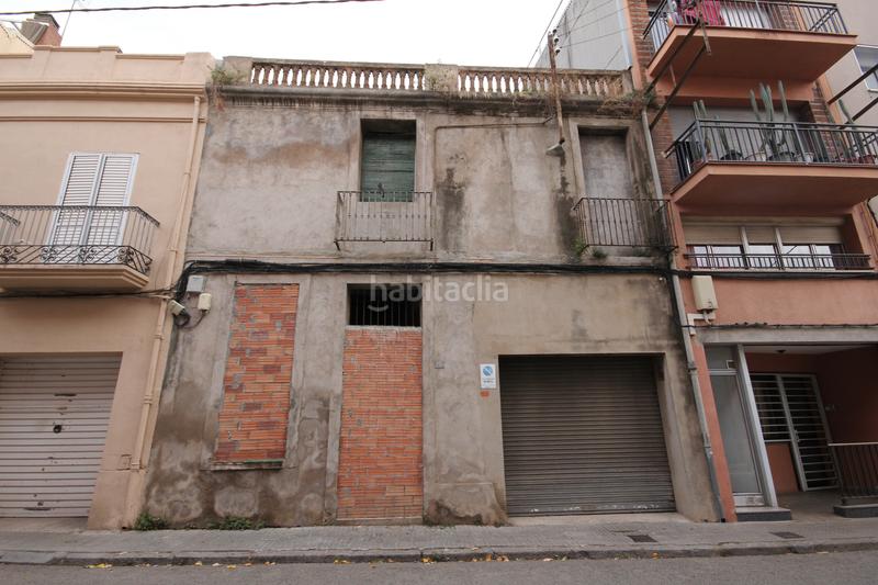 Foto b7875412-4afa-4ea9-9e28-06d7ad2a0001. Casa adossada a Joan Prim Granollers