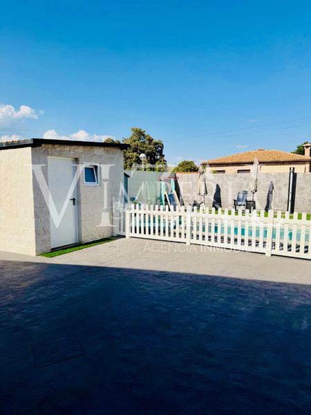 Foto 6c6a3902-9c2c-4b66-9165-6721e4b81cf5. Casa amb xemeneia calefacció aparcament piscina a Hormigos