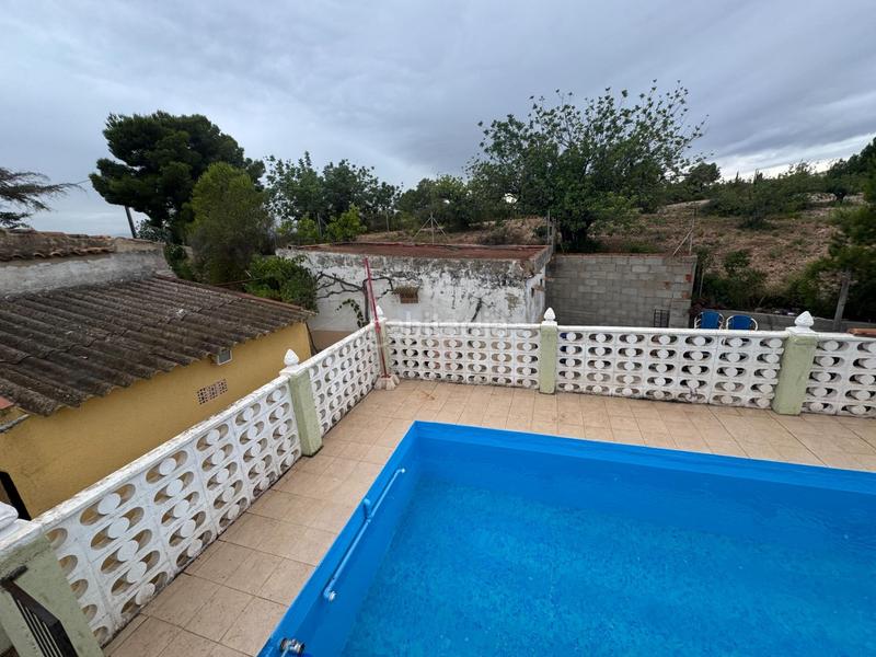 Foto 2319137e-3421-46f4-9125-4c9b715ae276. Chalet  con terreno y piscina en Alborache