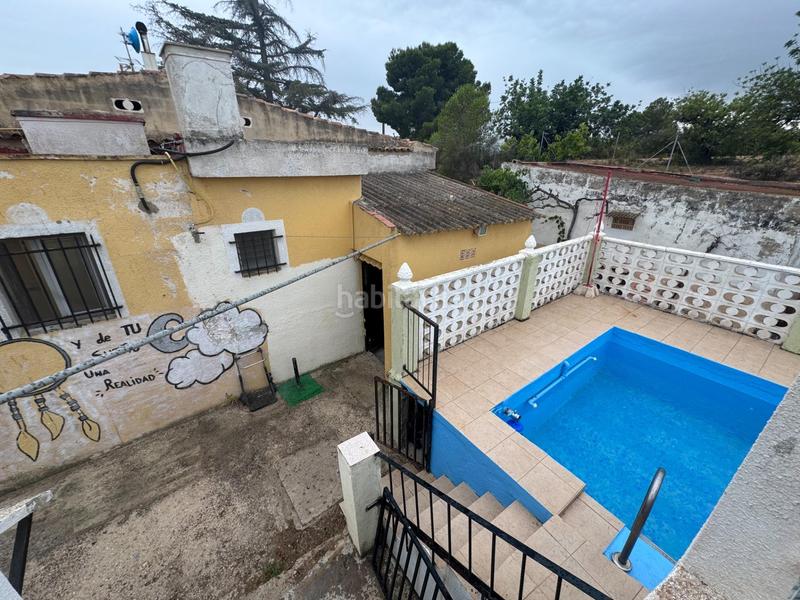 Foto 9349f1ac-9a8d-4a65-b40f-5aa59a6e4d10. Chalet  con terreno y piscina en Alborache