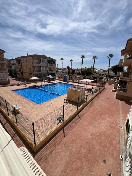 Foto 55455b7f-3578-4de2-a3f3-a2acec378009. Alquiler piso  en urbanización con piscina y parking privado en Alcázares (Los)