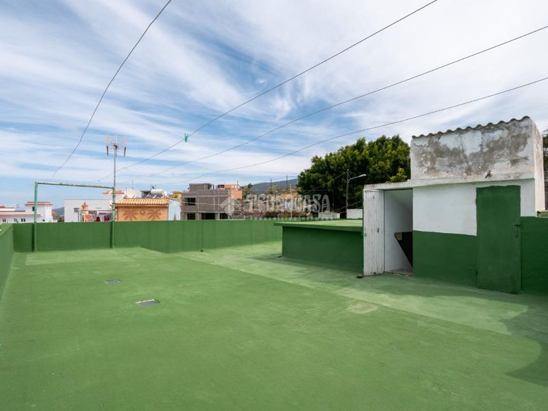 Foto bc6826c1-b873-4e7c-a4ee-b01e37f244e1. Casa aparellada amb aparcament a Guía de Isora interior Guía de Isora