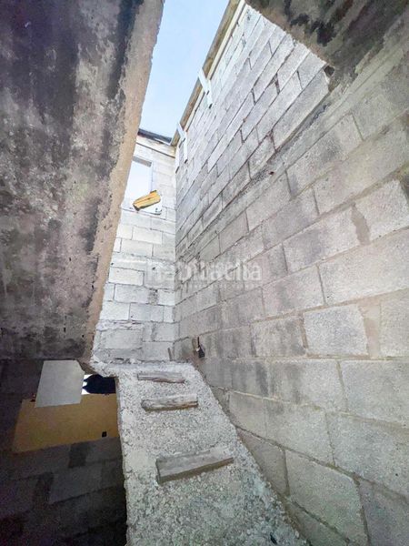 Foto f09af60f-6e65-4d36-aade-aec60b0d92e6. Casa aparellada a Chío Guía de Isora