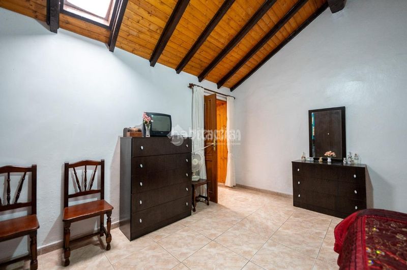 Foto 0866f39f-4c4e-4a11-9667-f4f3add22df7. Casa aparellada amb aparcament a Chío Guía de Isora