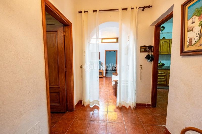 Foto 0ac4a5f7-1c54-4359-a86f-1de7b40c5138. Casa aparellada amb aparcament a Chío Guía de Isora