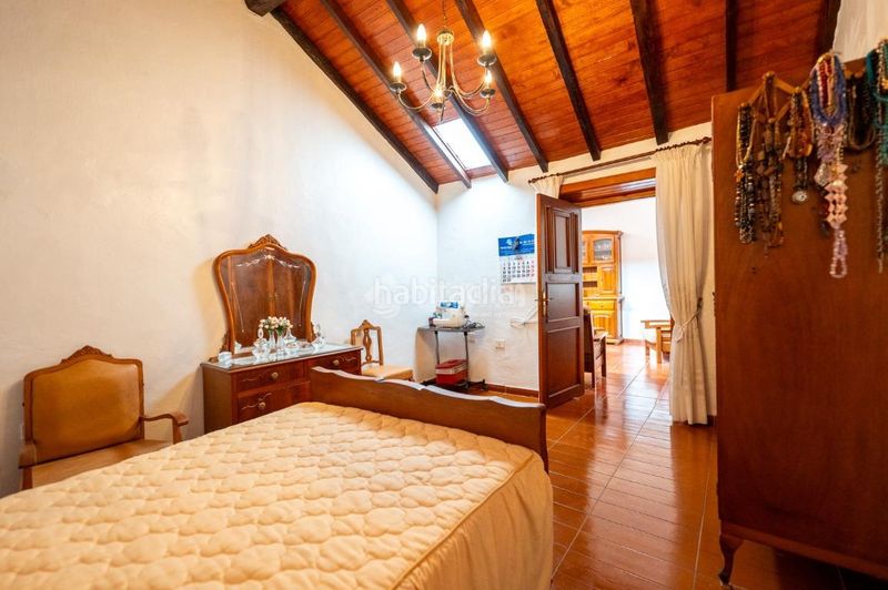 Foto ab1ba52a-8582-4893-8c11-041b3965b665. Casa aparellada amb aparcament a Chío Guía de Isora