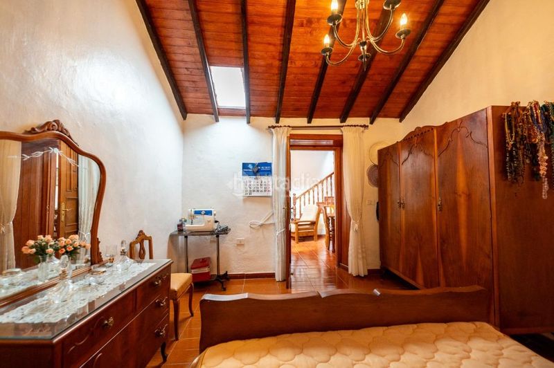 Foto b8fe5b9f-e24e-4e5f-bee6-f86709ae62c1. Casa aparellada amb aparcament a Chío Guía de Isora