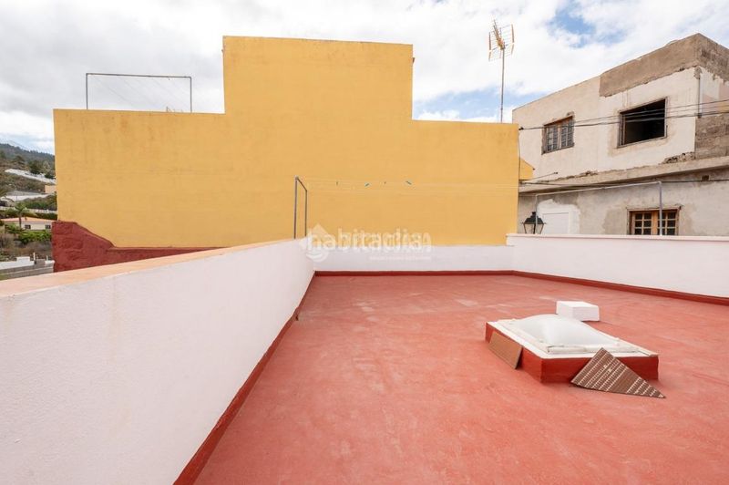 Foto cd0c0a63-d214-40d4-9b3c-f137769eec17. Casa aparellada amb aparcament a Chío Guía de Isora