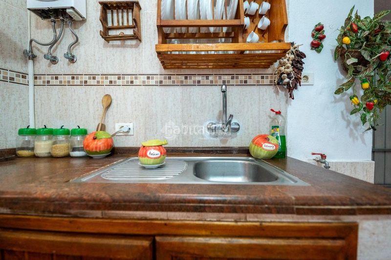 Foto fb9d4f7b-a8de-4b8e-a371-cadab83f3215. Casa aparellada amb aparcament a Chío Guía de Isora