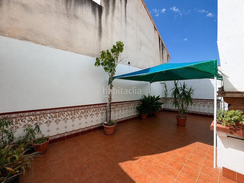 Foto f8012561-6fd2-4854-add0-2cb1fc70f205. Casa adossada amb aparcament a Enguera