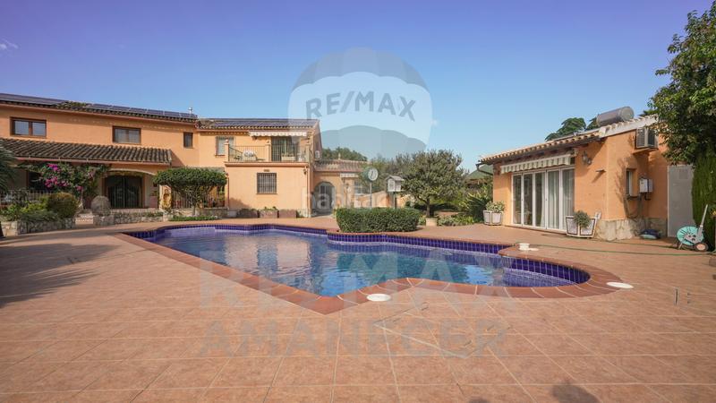 Foto c8ac64ff-b962-42b0-ad50-38882c43b5b5. Maison avec chauffage parking piscine dans Pedreguer