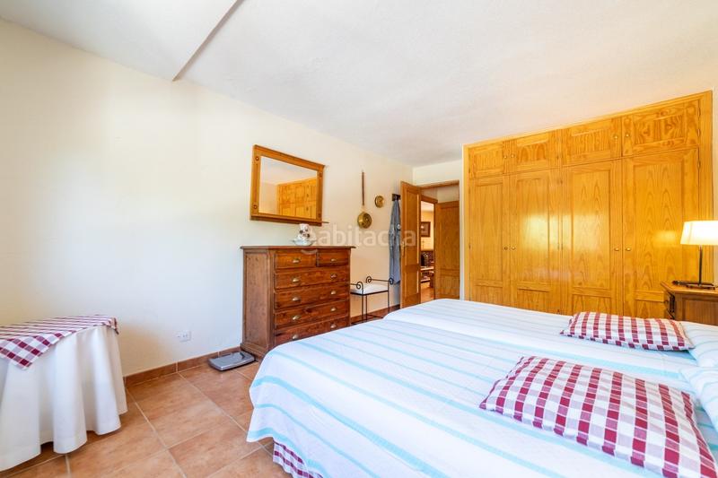 Foto 573df41b-6b52-4e63-bcbe-873263c54369. Chalet  pareado con una bonita parcela , 5 dormitorios , 3 baños, porche , terraza , jardín y garaje en Moralzarzal