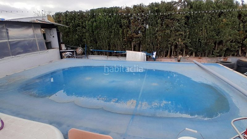 Foto 61d90c64-2cbd-4bd6-bd1d-0d54eb48713e. Casa amb aparcament piscina a Yecla