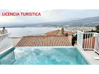 Haus in Calle de la pujada del puig rom 262. Casa con apartamento independiente , garaje, piscina infinity e