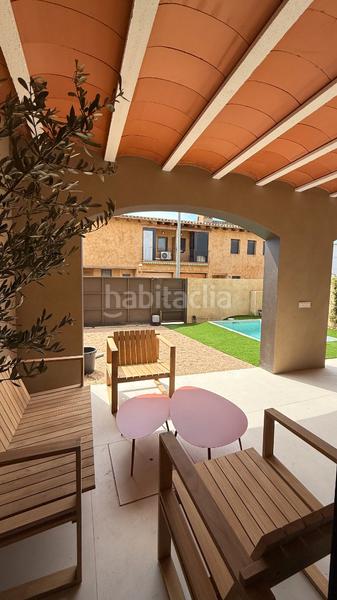 Foto 0775e568-af36-4e19-9370-14729efc7b06. Casa adossada 173m<sup>2</sup> amb xemeneia calefacció aparcament piscina a Pals